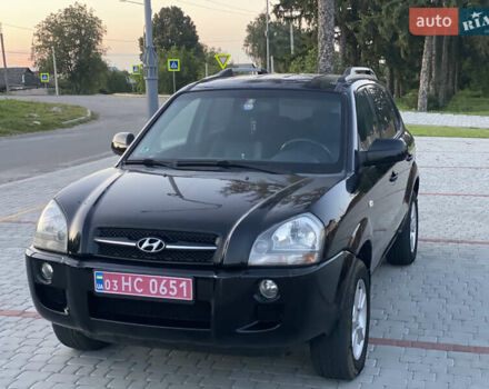 Черный Хендай Туксон, объемом двигателя 2 л и пробегом 250 тыс. км за 7950 $, фото 40 на Automoto.ua