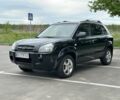 Черный Хендай Туксон, объемом двигателя 2 л и пробегом 233 тыс. км за 7500 $, фото 1 на Automoto.ua