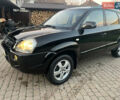 Черный Хендай Туксон, объемом двигателя 2 л и пробегом 276 тыс. км за 7450 $, фото 3 на Automoto.ua