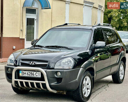 Черный Хендай Туксон, объемом двигателя 2 л и пробегом 141 тыс. км за 6999 $, фото 2 на Automoto.ua