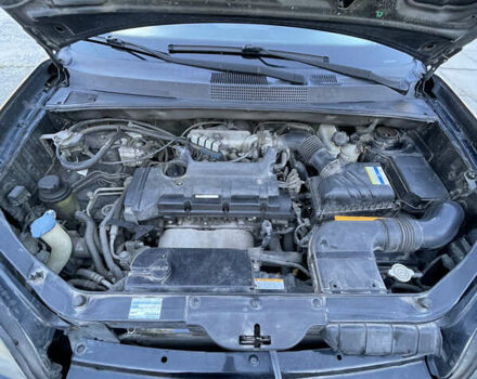 Черный Хендай Туксон, объемом двигателя 1.98 л и пробегом 262 тыс. км за 7900 $, фото 12 на Automoto.ua