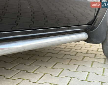 Чорний Хендай Туксон, об'ємом двигуна 2 л та пробігом 156 тис. км за 7850 $, фото 56 на Automoto.ua