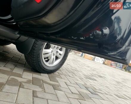 Чорний Хендай Туксон, об'ємом двигуна 2 л та пробігом 225 тис. км за 8000 $, фото 52 на Automoto.ua