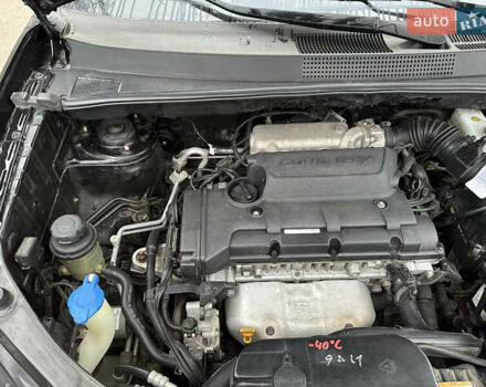 Черный Хендай Туксон, объемом двигателя 2 л и пробегом 136 тыс. км за 8500 $, фото 37 на Automoto.ua