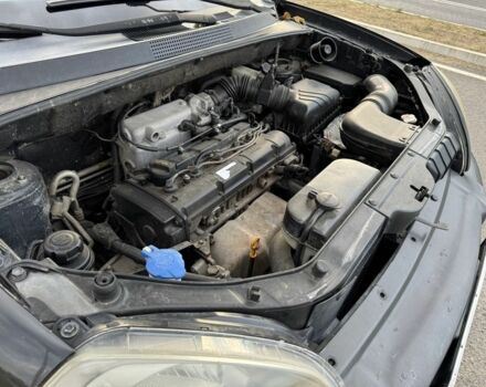 Чорний Хендай Туксон, об'ємом двигуна 2 л та пробігом 291 тис. км за 5400 $, фото 6 на Automoto.ua