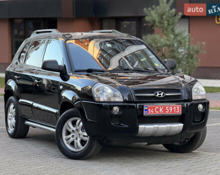 Чорний Хендай Туксон, об'ємом двигуна 2 л та пробігом 156 тис. км за 7850 $, фото 5 на Automoto.ua