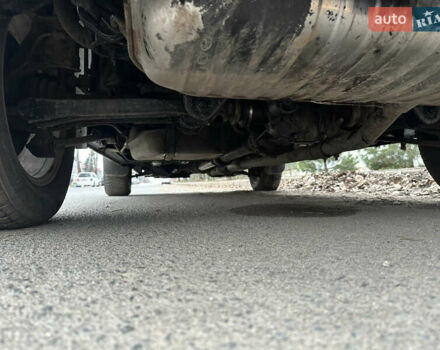 Черный Хендай Туксон, объемом двигателя 2 л и пробегом 136 тыс. км за 8500 $, фото 39 на Automoto.ua