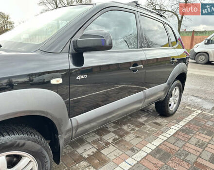 Чорний Хендай Туксон, об'ємом двигуна 2.66 л та пробігом 395 тис. км за 9950 $, фото 4 на Automoto.ua