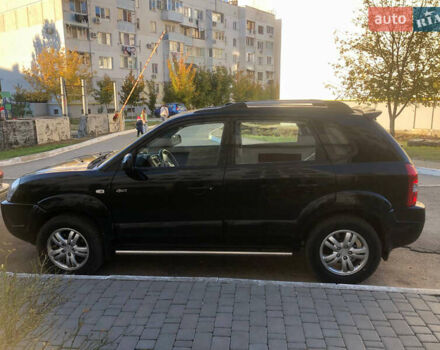 Черный Хендай Туксон, объемом двигателя 1.98 л и пробегом 256 тыс. км за 8200 $, фото 5 на Automoto.ua