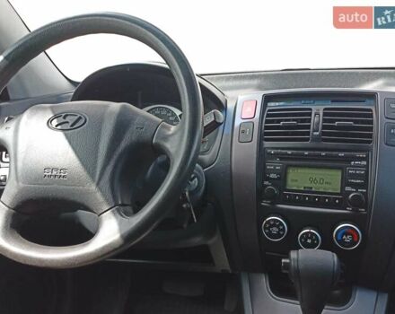 Чорний Хендай Туксон, об'ємом двигуна 1.98 л та пробігом 220 тис. км за 8500 $, фото 13 на Automoto.ua
