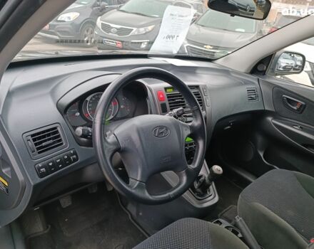 Чорний Хендай Туксон, об'ємом двигуна 2 л та пробігом 192 тис. км за 7990 $, фото 18 на Automoto.ua