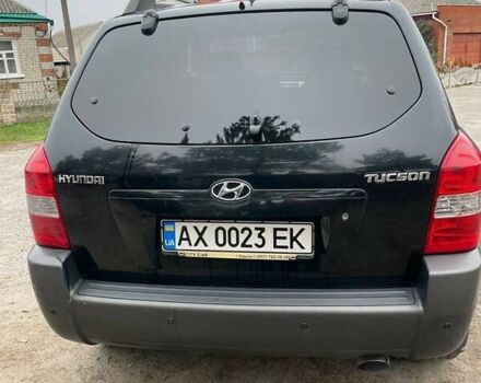 Черный Хендай Туксон, объемом двигателя 1.98 л и пробегом 290 тыс. км за 7000 $, фото 3 на Automoto.ua