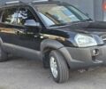Чорний Хендай Туксон, об'ємом двигуна 1.98 л та пробігом 215 тис. км за 8350 $, фото 2 на Automoto.ua