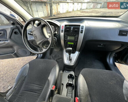 Чорний Хендай Туксон, об'ємом двигуна 2 л та пробігом 240 тис. км за 8500 $, фото 19 на Automoto.ua