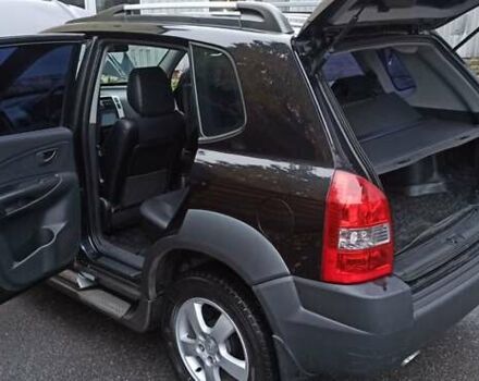 Хендай Туксон 2008 у Харкові на Automoto.ua Чорний Хендай Туксон, об'ємом двигуна 1.99 л та пробігом 188 тис. км за 8800 $, фото 13 на Automoto.ua