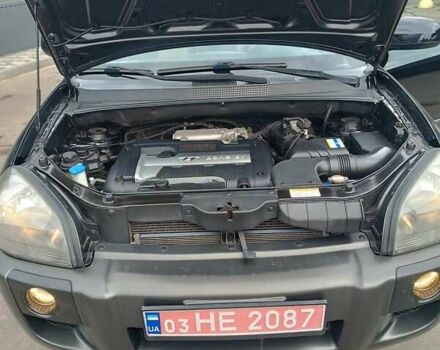 Черный Хендай Туксон, объемом двигателя 2 л и пробегом 255 тыс. км за 8700 $, фото 32 на Automoto.ua