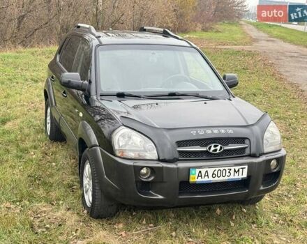 Черный Хендай Туксон, объемом двигателя 2 л и пробегом 148 тыс. км за 9500 $, фото 7 на Automoto.ua