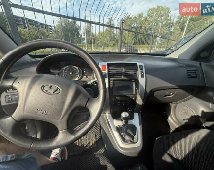 Черный Хендай Туксон, объемом двигателя 2 л и пробегом 218 тыс. км за 6700 $, фото 7 на Automoto.ua