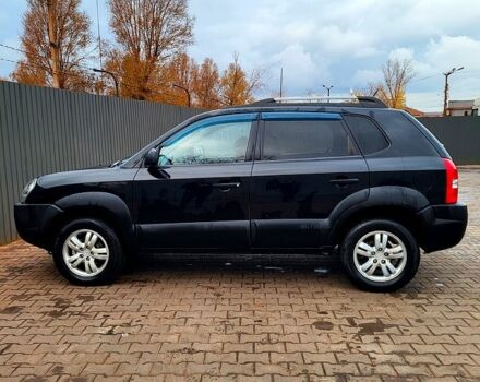 Черный Хендай Туксон, объемом двигателя 2 л и пробегом 223 тыс. км за 7500 $, фото 12 на Automoto.ua