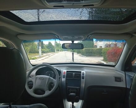 Чорний Хендай Туксон, об'ємом двигуна 2 л та пробігом 260 тис. км за 6750 $, фото 5 на Automoto.ua