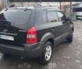 Черный Хендай Туксон, объемом двигателя 2 л и пробегом 200 тыс. км за 8300 $, фото 6 на Automoto.ua