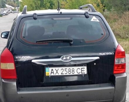 Чорний Хендай Туксон, об'ємом двигуна 2 л та пробігом 142 тис. км за 4650 $, фото 4 на Automoto.ua