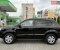 Черный Хендай Туксон, объемом двигателя 1.98 л и пробегом 239 тыс. км за 8700 $, фото 2 на Automoto.ua