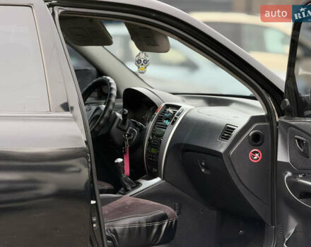 Черный Хендай Туксон, объемом двигателя 2 л и пробегом 252 тыс. км за 7200 $, фото 17 на Automoto.ua