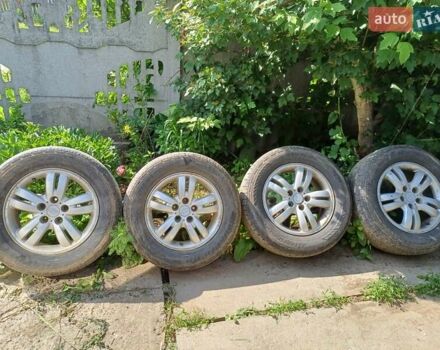 Черный Хендай Туксон, объемом двигателя 1.98 л и пробегом 189 тыс. км за 7800 $, фото 22 на Automoto.ua