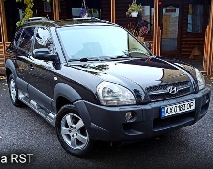 Чорний Хендай Туксон, об'ємом двигуна 2 л та пробігом 188 тис. км за 8800 $, фото 5 на Automoto.ua