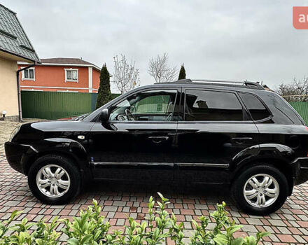 Чорний Хендай Туксон, об'ємом двигуна 2 л та пробігом 182 тис. км за 8299 $, фото 8 на Automoto.ua