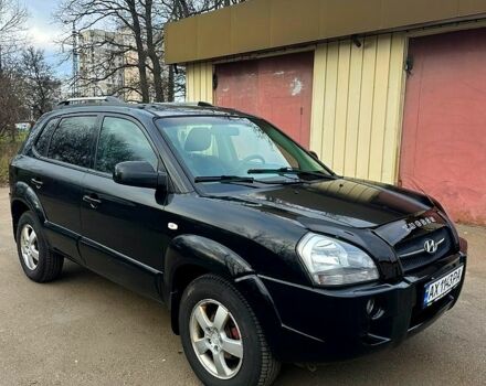 Черный Хендай Туксон, объемом двигателя 2 л и пробегом 215 тыс. км за 6700 $, фото 6 на Automoto.ua