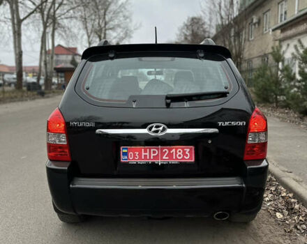 Черный Хендай Туксон, объемом двигателя 2 л и пробегом 136 тыс. км за 8500 $, фото 9 на Automoto.ua