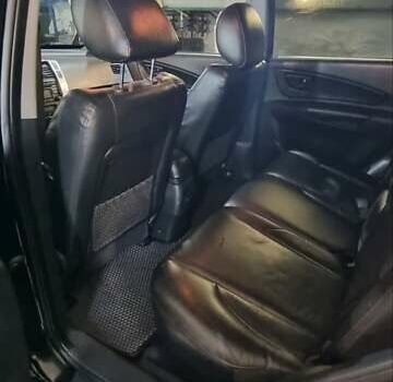 Черный Хендай Туксон, объемом двигателя 2.66 л и пробегом 311 тыс. км за 7200 $, фото 3 на Automoto.ua