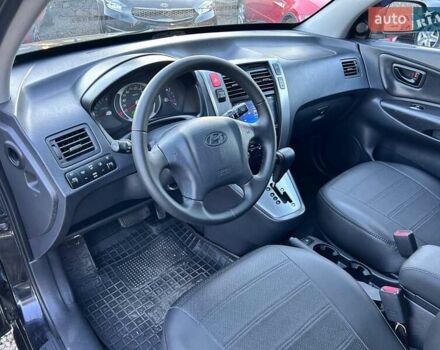 Черный Хендай Туксон, объемом двигателя 2 л и пробегом 230 тыс. км за 7500 $, фото 16 на Automoto.ua