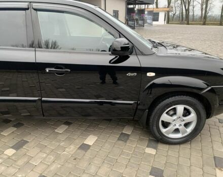 Черный Хендай Туксон, объемом двигателя 2 л и пробегом 198 тыс. км за 7500 $, фото 2 на Automoto.ua