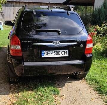 Чорний Хендай Туксон, об'ємом двигуна 1.98 л та пробігом 224 тис. км за 8000 $, фото 4 на Automoto.ua