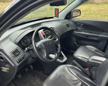 Черный Хендай Туксон, объемом двигателя 2 л и пробегом 161 тыс. км за 7599 $, фото 3 на Automoto.ua