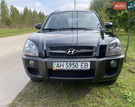 Чорний Хендай Туксон, об'ємом двигуна 2 л та пробігом 160 тис. км за 8800 $, фото 1 на Automoto.ua