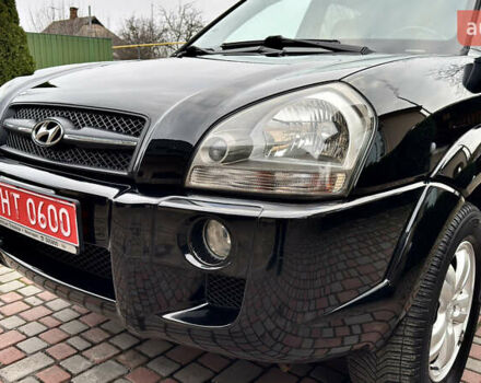 Чорний Хендай Туксон, об'ємом двигуна 2 л та пробігом 182 тис. км за 8299 $, фото 81 на Automoto.ua