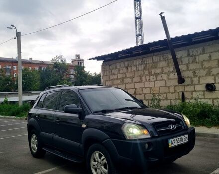 Черный Хендай Туксон, объемом двигателя 2 л и пробегом 152 тыс. км за 7800 $, фото 2 на Automoto.ua