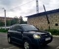 Черный Хендай Туксон, объемом двигателя 2 л и пробегом 152 тыс. км за 7800 $, фото 2 на Automoto.ua