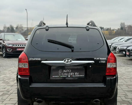 Чорний Хендай Туксон, об'ємом двигуна 2 л та пробігом 240 тис. км за 6888 $, фото 9 на Automoto.ua