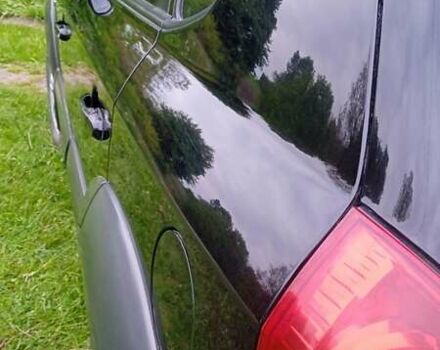 Черный Хендай Туксон, объемом двигателя 1.98 л и пробегом 200 тыс. км за 6600 $, фото 3 на Automoto.ua