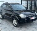 Чорний Хендай Туксон, об'ємом двигуна 2 л та пробігом 110 тис. км за 8750 $, фото 10 на Automoto.ua