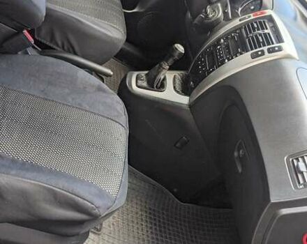 Черный Хендай Туксон, объемом двигателя 2 л и пробегом 163 тыс. км за 8100 $, фото 20 на Automoto.ua