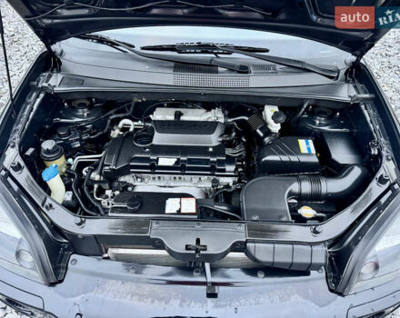 Черный Хендай Туксон, объемом двигателя 1.98 л и пробегом 96 тыс. км за 9900 $, фото 7 на Automoto.ua