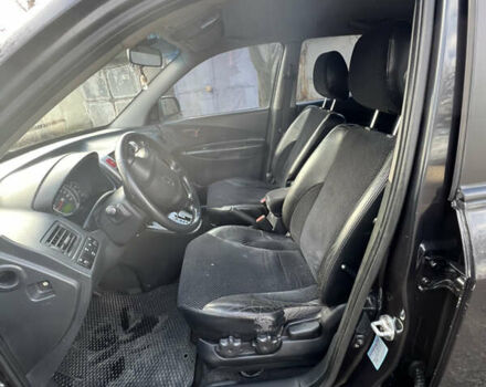 Чорний Хендай Туксон, об'ємом двигуна 2 л та пробігом 240 тис. км за 8500 $, фото 15 на Automoto.ua