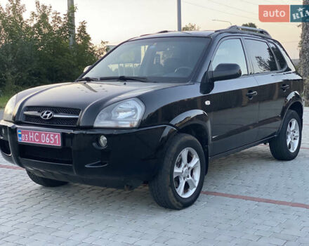 Черный Хендай Туксон, объемом двигателя 2 л и пробегом 250 тыс. км за 7950 $, фото 5 на Automoto.ua