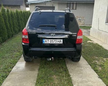 Черный Хендай Туксон, объемом двигателя 2 л и пробегом 255 тыс. км за 8300 $, фото 2 на Automoto.ua